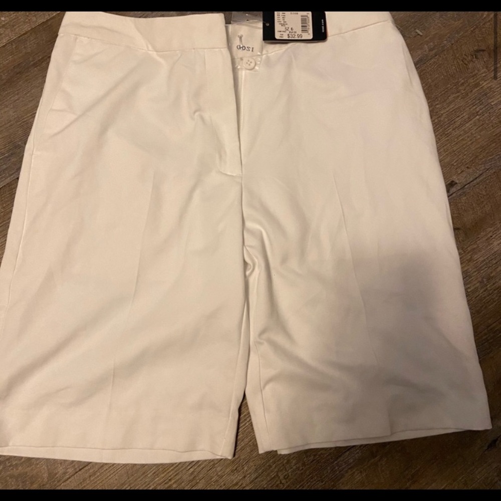 Izod size 6 NWT tags long golf shirt.